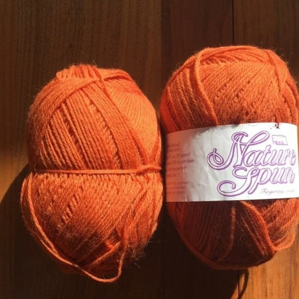 2 skeins Nature Spun fingering wool yarn.